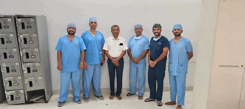 Dr Nikhil Oza with the operating theatre team